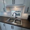 The Modern Tiny Home with Split Loft – Smart Space, Timeless Style (H33SL)